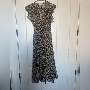 Sienna sky size small leopard print faux wrap dress with pockets &button skirt.
